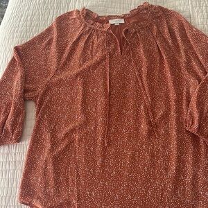 Pumpkin colored light weight top
